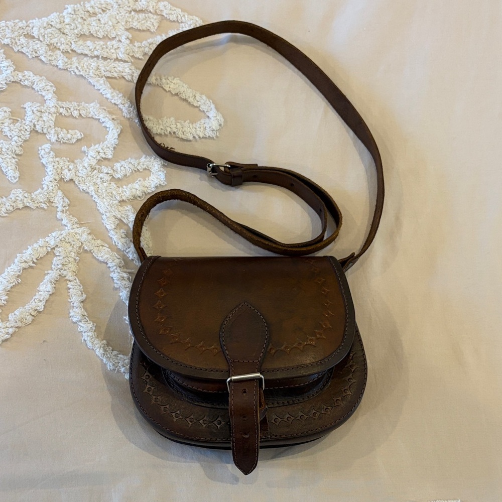 Vintage -style, hand-tooled brown leather crossbody saddle bag